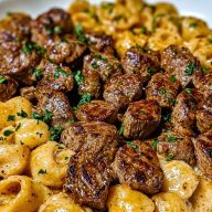 Cajun Steak Bites and Cheesy Garlic Shells Skillet
