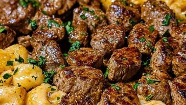 Cajun Steak Bites and Cheesy Garlic Shells Skillet