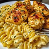 Creamy Garlic Parmesan Chicken with Cheesy Twisted Pasta